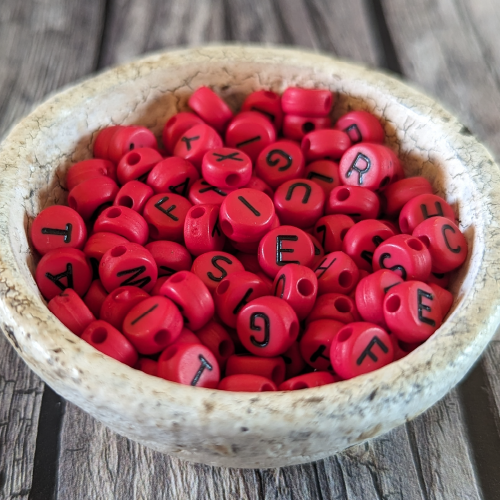 Red Base, Black Letters